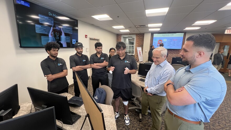 Having spent nearly two months putting it together, the Springfield College students behind their "Dr. Money" app presented their work to experts Wednesday, July 9 - the culmination of WNE's "FinTech + AI 413 Startup" competition.