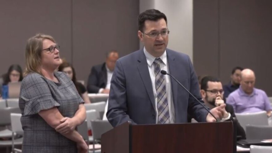 Eric Lewis, right, and Misty Ndiritu, of Noble Education Initiative, talk to the State Board of Education on Wednesday, June 5, 2019.