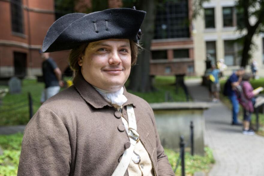 Tom Dietzel portrays Paul Revere at the Granary Burying Ground on Tremont Street in Boston.  (Robin Lubbock/WBUR)