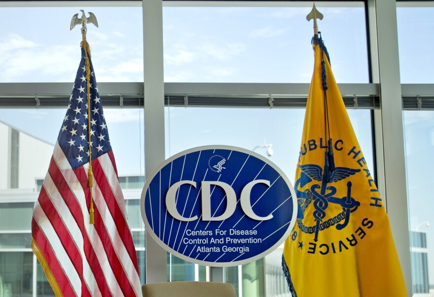 FILE - This Nov. 19, 2013 file photo shows a Centers for Disease Control and Prevention logo at the agency's federal headquarters in Atlanta. In a growing medical mystery, a person who died in July 2021 in Georgia has been confirmed as the fourth U.S. case this year of an illness caused by the meliodosis bacteria from South Asia. On Monday, Aug. 9, 2021, the Centers for Disease Control and Prevention sent an alert about the latest case to U.S. doctors. (AP Photo/David Goldman, File)