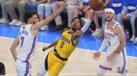 Indiana Pacers guard Tyrese Haliburton (0) shoots as Oklahoma City Thunder forward Chet Holmgren (7) defends during the second half of Game 5 of the NBA Finals basketball series, Monday, June 16, 2025, in Oklahoma City.