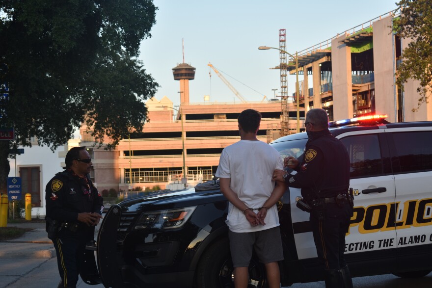 One activist was detained. After police reviewed footage and saw the activist was trying to clean graffiti rather than spray it. The detained activist was quickly released.