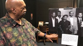 Herman Johnson, Jr., director of the Mound Bayou Museum in Mound Bayou, Mississippi. He points to a 1955 photo display in the museum of Mamie Till, Cong. Charles Diggs, Dr. T.R.M. Howard and others. October24, 2022