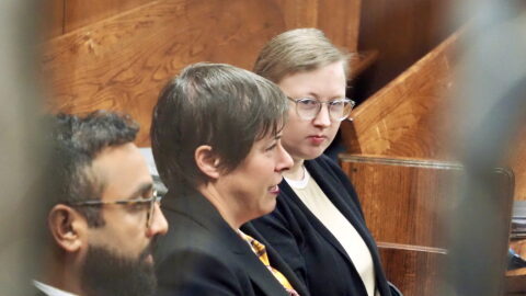 Former Norman High School teacher Summer Boismier, far right, sits next to her attorneys, Iris Halpern, center, and Neil Sandhu, left, before a hearing in Oklahoma County District Court on Wednesday in Oklahoma City.