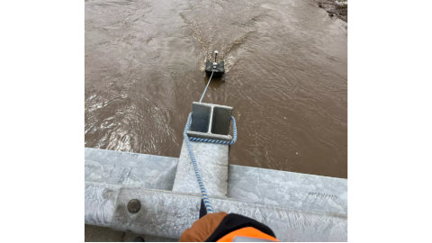 water filling up behind a concrete dam