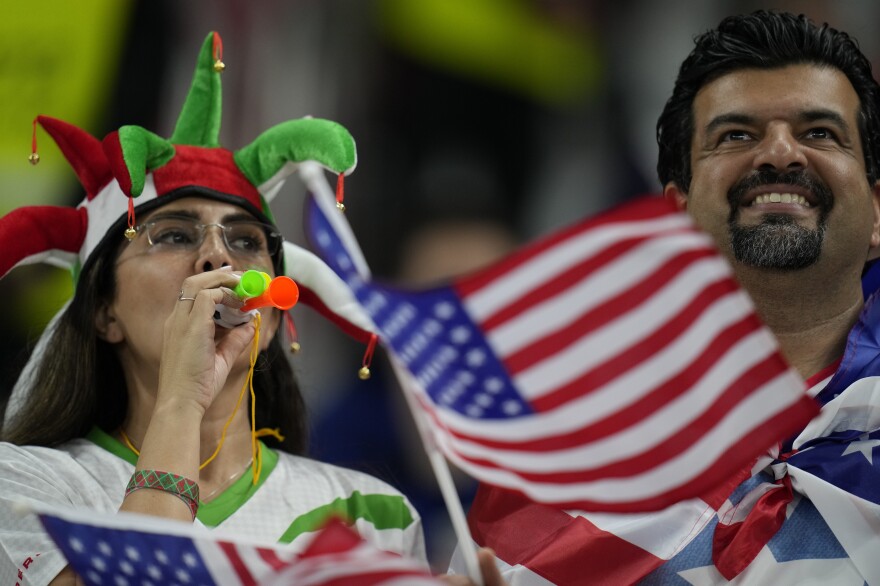 Supporters cheer prior to the World Cup group B soccer match between Iran and the United States at the Al Thumama Stadium in Doha, Qatar.