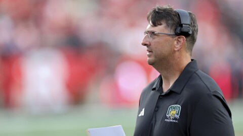 Ohio's head coach Brian Smith is seen against Rutgers during an NCAA football game on Thursday, Aug. 28, 2025, in Piscataway, N.J. (AP Photo/Gregory Payan)