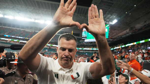 Miami head coach Mario Cristobal celebrates after Miami defeated Florida State in double overtime of an NCAA college football game, Saturday, Oct. 17, 2026, in Miami Gardens, Fla. (AP Photo/Lynne Sladky)