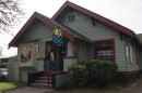 A customer walks into Eugene's House of Records on April 7, 2026. The business has called this converted house its home since 1973.