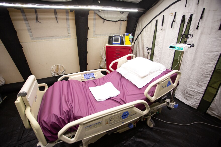 A tent set up to treat patients at the Austin Convention Center in case area hospitals are overwhelmed by COVID cases. The field hospital closed in March before the latest surge in cases.  