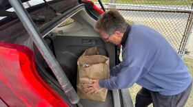 Many of the families that went to the Lee-Miles Hunger Center Wednesday were referred by the United Way's 211 crisis hotline.