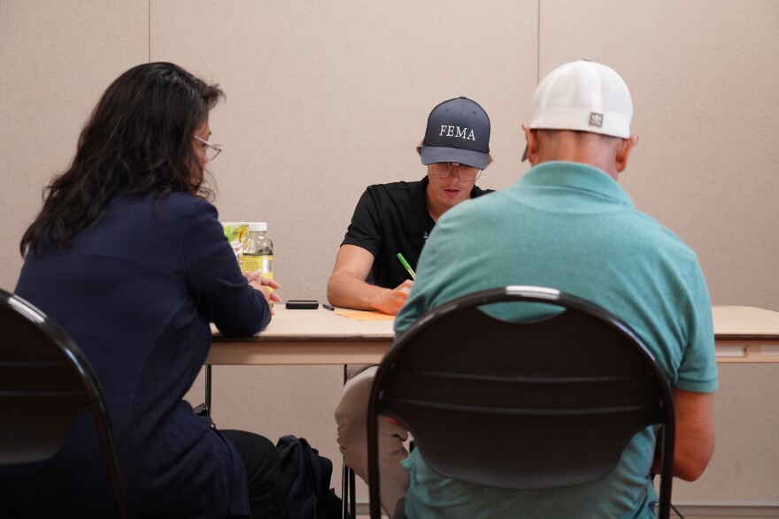 Disaster Survivor Assistance team members register survivors for assistance at a Multi-Agency Resource Center in Fort Pierce. The area was hard hit by tornadoes caused by Hurricane Milton.