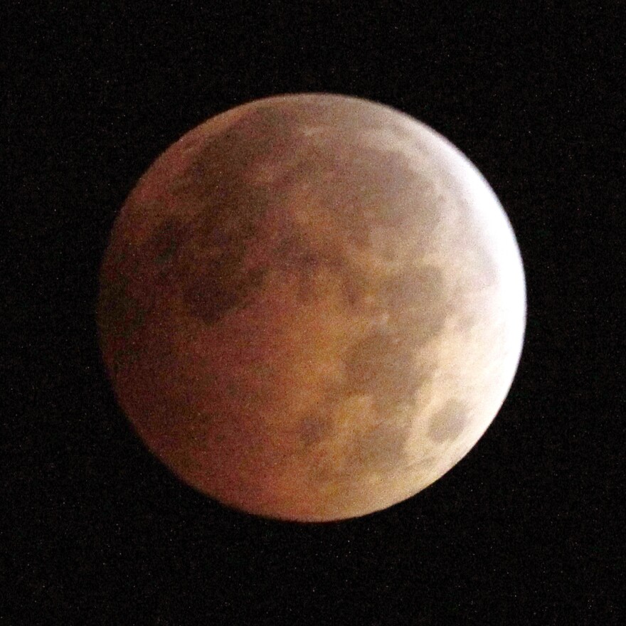 The Blood Moon, created by the full moon passing into the shadow of the earth during a total lunar eclipse, as seen from Monterey Park, Calif.