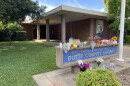 Flowers are left outside the Butte County Library in Chico, Calif. on June 25, 2026.
