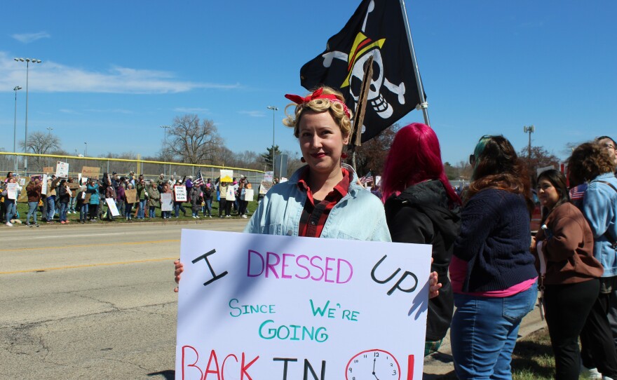Jenna Adair dresses up at Rosie the Riveter at the Peoria "No Kings" protest.