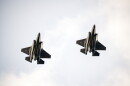 Two US F 35 fighter jets training.