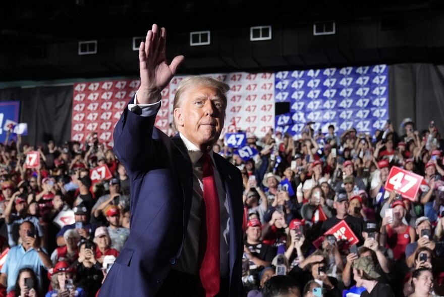 Republican presidential nominee former President Donald Trump waves at a campaign rally at Greensboro Coliseum, Tuesday, Oct. 22, 2024, in Greensboro, N.C.