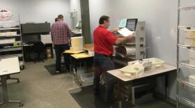 Hillsborough County elections officials conduct a machine recount Nov. 11. However, they decided against submitting those results due to figures showing 846 fewer votes than the first tally.