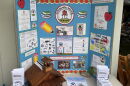 A posterboard illustrating the history, goals and mission statement behind the Community Helping Schools nonprofit, started by Kathie Wells in 2000. This was displayed at the organization's annual garage sale in Kailua on Aug. 15.