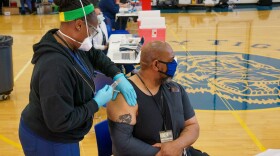 Lanier Hardy, a building engineer at John P. Parker School, received his first dose of the COVID-19 vaccine on Jan. 28, 2021.