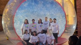 UA Little Rock leadership pose for a photo at the 2025 Winter Fest celebration.