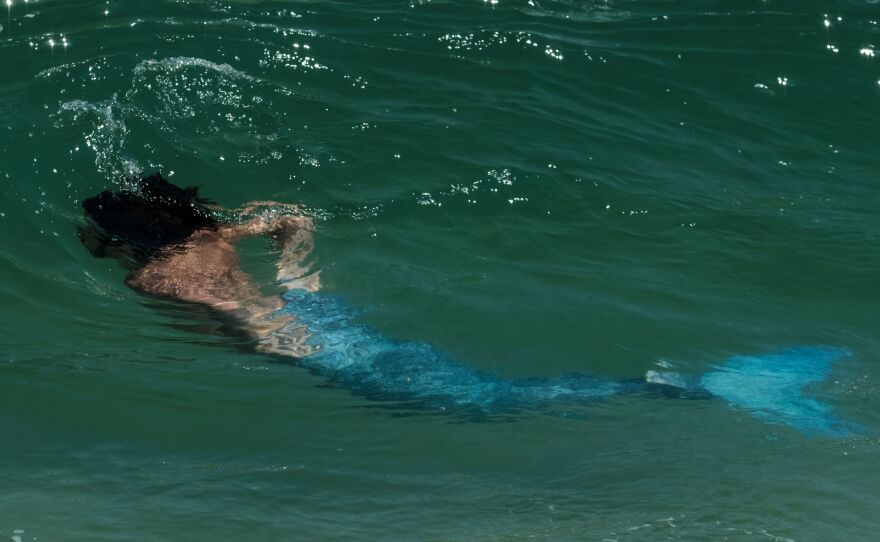 Davi de Oliveira Moreira swims in his mermaid costume at Ipanema Beach in Rio de Janeiro, Brazil, last May.