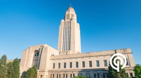 The Nebraska State Capitol tower against a clear sky