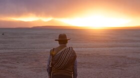 Virginio looks into the distance of his lands in the Bolivian highlands that are facing the consequences of climate change, threatening his traditional way of life.