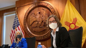Barbara J. Vigil, right, and New Mexico Gov. Michelle Lujan Grisham. The governor announced Vigil is resigning from her position by the end of the month. She will transition to serving on the agency's Policy Advisory Council instead.