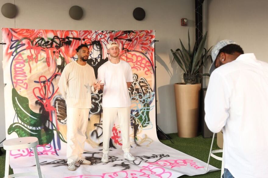 Ra Kazadi (left) and Rob Grass (right) posing during a Nostalgia and Noise event.