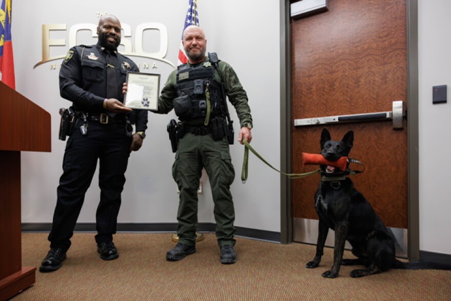 A Deputy Sheriff and his K9 companion.