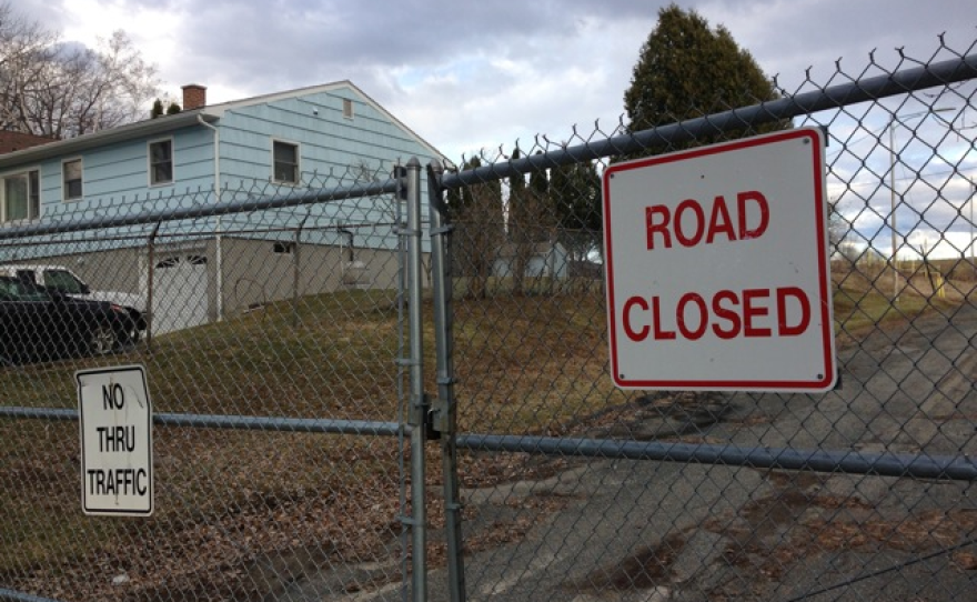 A road on the edge of the Allendale neighborhood in Pittsfield, Mass., leads to a PCB disposal site used during the first phase of the clean up of the Housatonic River, in a file photo.