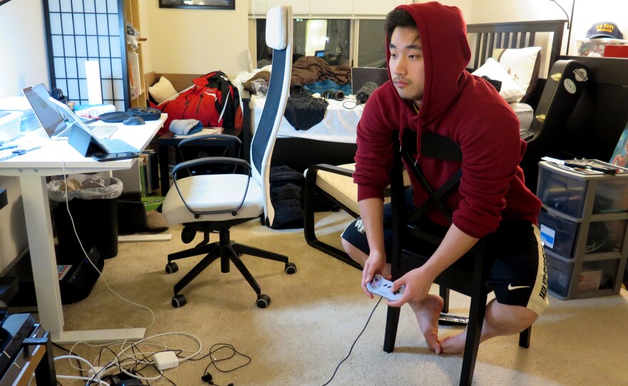 Brian Kim, a 25-year-old gamer from Virginia, enjoys playing The Legend of Zelda on the Super NES Classic. He says he bought the retro-console soon after it came out.