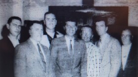 A photo taken at the Labor Temple during JFK's 1959 visit to Rhinelander. Pictured left to right; Fred Hauser, Ray Klescewski, Lloyd Miller, John F. Kennedy, Fred Langbecker, Bob Ullich, Clarence Pecore.