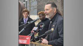 Front: United University Professions president Fred Kowal with students Nick Smith (left) and Elisha Martin (right)