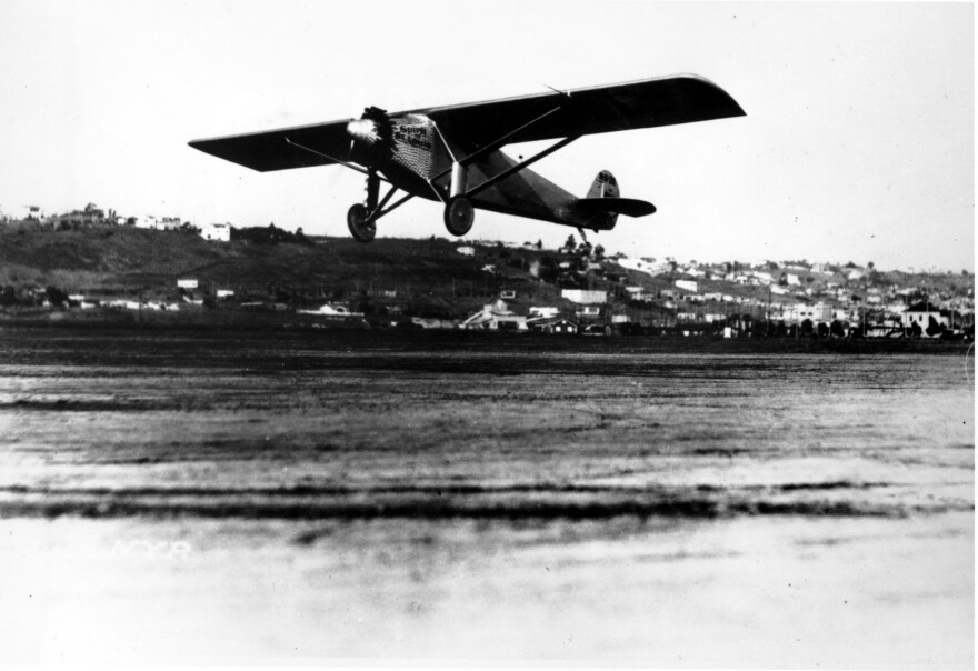 Charles Lindbergh flies "The Spirit of St. Louis" out of an undetermined location in May, 1927, prior to his flight from New York to Paris, the first to complete a solo non-stop transcontinental flight. (AP Photo)