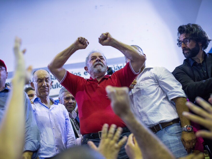 Brazilian prosecutors are seeking the arrest of former President Luiz Inacio Lula da Silva, shown here during a rally on March 4 in Sao Paulo. He is accused of corruption and embezzlement.