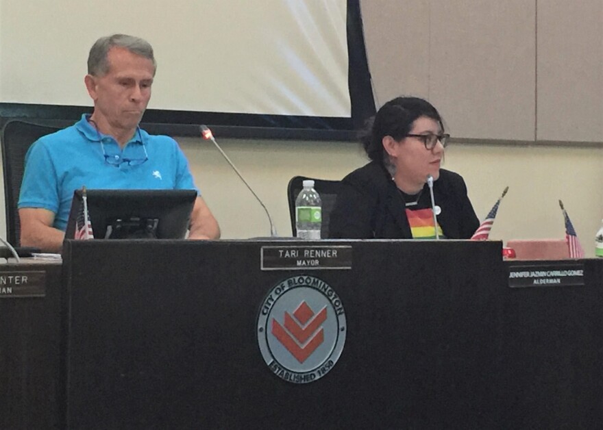 Mayor and Council member in the council chambers.