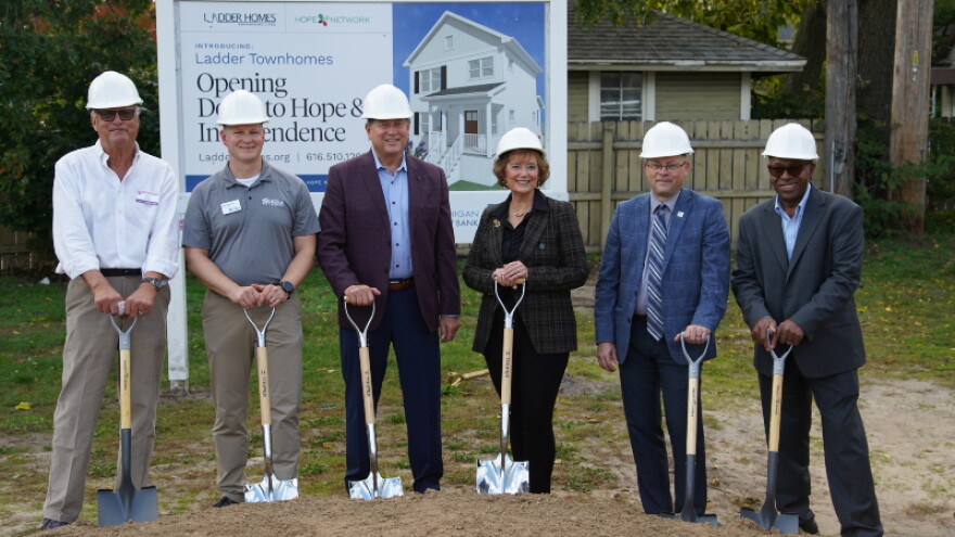 Leaders from Hope Network, Ladder Homes, and Lakeshore Habitat break ground on a new housing project in Holland.