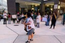 About 150 people protested the presence of Immigration and Customs Enforcement agents at area hotels at a rally Wednesday near the Luminary Hotel in downtown Fort Myers.