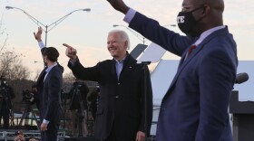 President-elect Joe Biden campaigns alongside Democratic Senate candidates Jon Ossoff (left) and the Rev. Raphael Warnock on Monday in Atlanta.