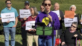 Joselle Torres, with Democracy North Carolina, an election and voter advocacy group, speaks at a news conference outside the Legislative Building in Raleigh, N.C., Tuesday, Oct. 10, 2023. Torres and other speakers urged lawmakers to uphold the vetoes of Democratic Gov. Roy Cooper on several bills. One would shift the power to appoint State Board of Elections members from the governor to legislative leaders, while another would end a three-day grace period to receive and count absentee ballots as long as they are postmarked by Election Day. (AP Photo/Gary D. Robertson)