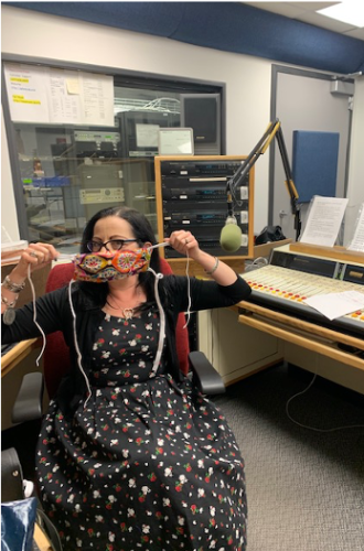 Dyana in the studio with one of her masks