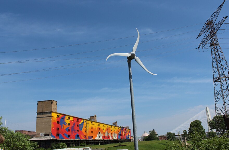 The roof of the William Kerr Foundation has a clear of the mural painted on the east side of the Cotton Belt Depot.