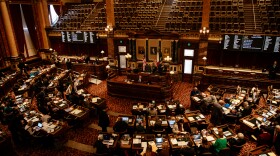 Lawmakers sit in the Senate chamber in the Iowa Senate. 