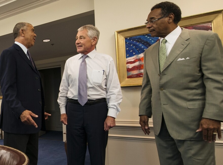 Rep. Lacy Clay, Defense Secretary Chuck Hagel and Rep. Emanuel Cleaver