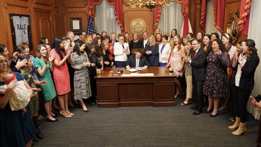  Gov. Ron DeSantis signs the legislation banning most abortions after six weeks of pregnancy on Thursday, April 13, 2023, after the Florida House passed the bill. 