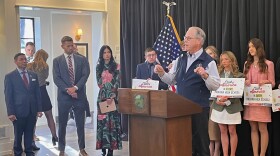 Braun speaking at press conference for TPUSA partnership