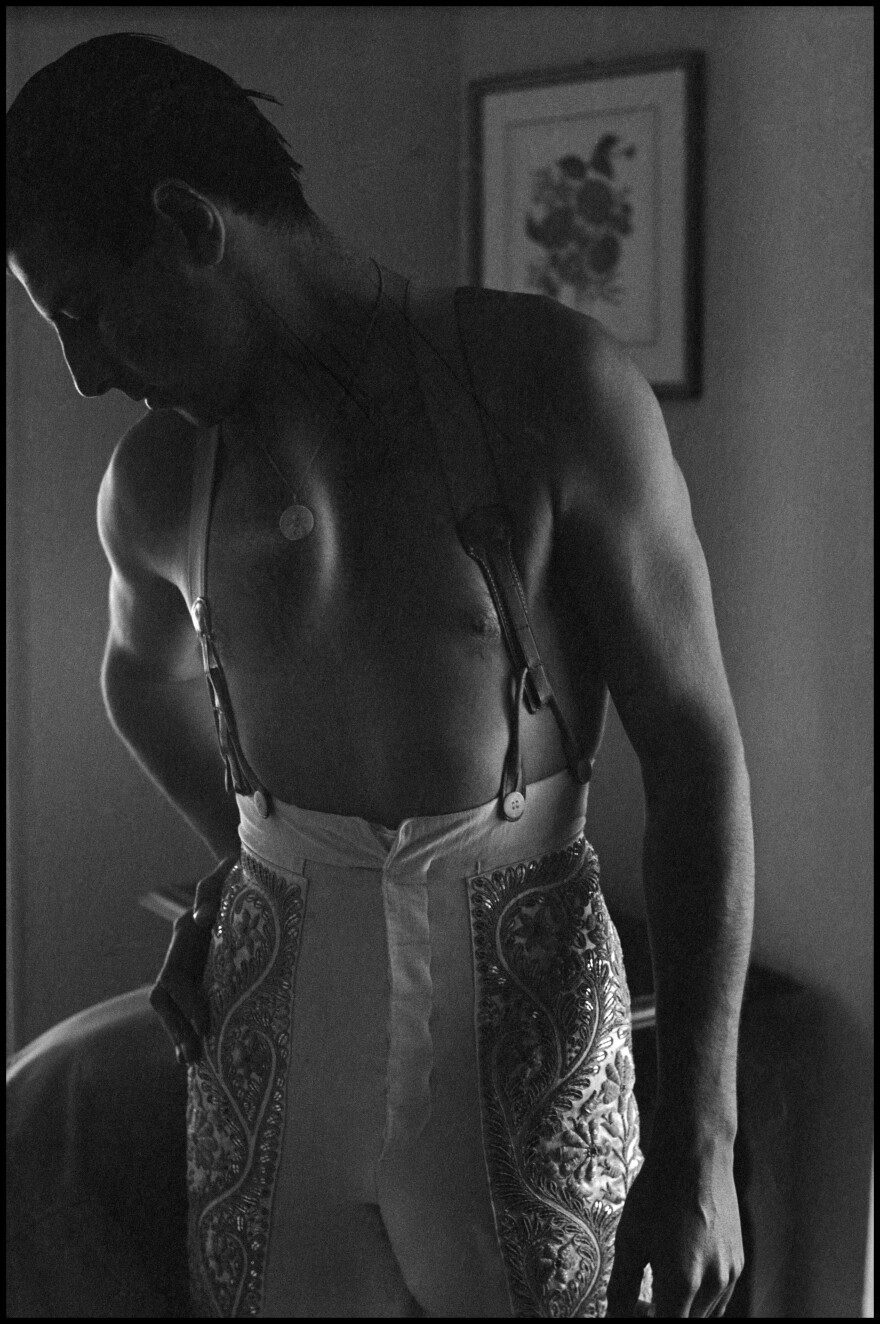 <em>Torero Antonio Ordóñez dressing for combat</em>, San Fermín, Pamplona, Spain, 1954