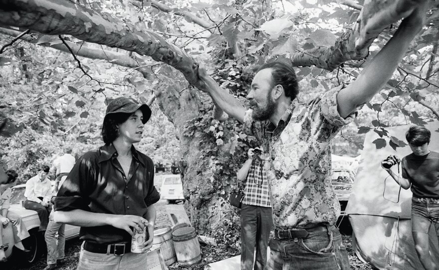Arlo Guthrie and Pete Seeger confer at a benefit played in Tarrytown, N.Y., for Hudson River Sloop Clearwater Inc., 1969. "He's the son of populist folk pioneer Woody Guthrie, but Arlo Guthrie, when he was only twenty-two, had found his own voice with his sardonic, counterculture anthem, 'Alice's Restaurant.' "